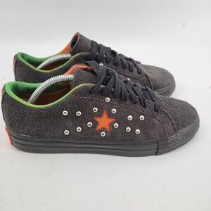 Converse Black and Orange Star Sneakers